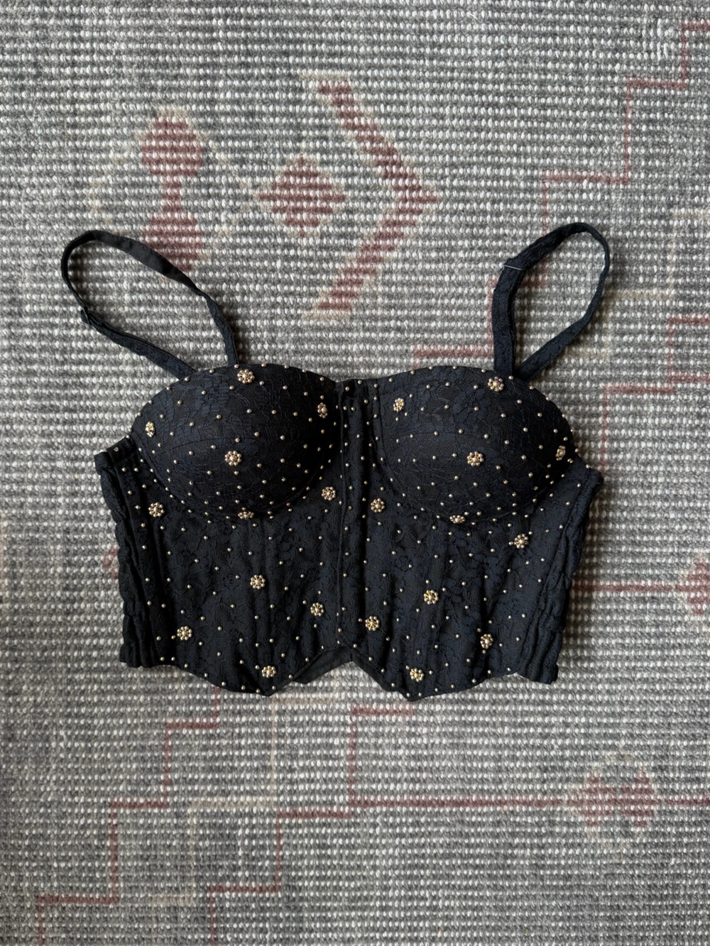 Vintage black bustier embellished with studs